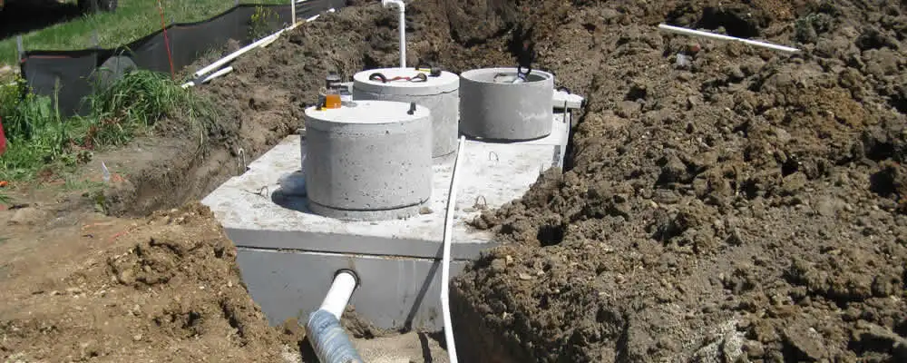 Septic system repair and installation site with tank access ports in Allentown, PA