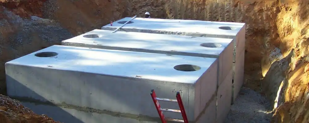 Septic tank installation site with a newly placed concrete tank in Allentown, PA